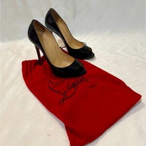 Christian Louboutin black heels red bottoms